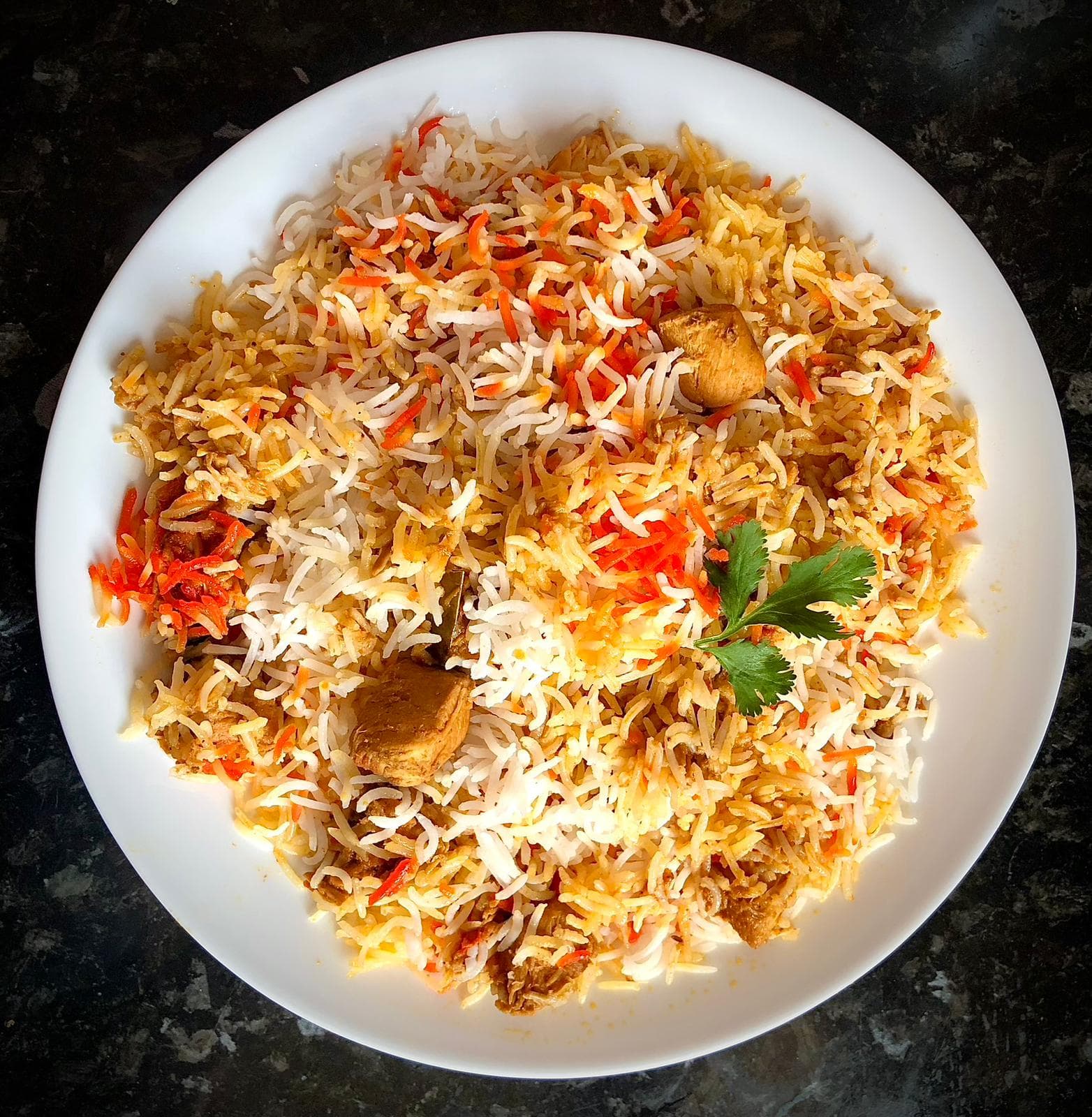 ABY's Chicken Biryani — tender chicken layered with saffron basmati rice